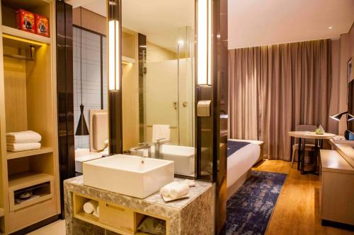 Imagen de la habitación del Hotel Echarm Dongxing Minzu Road. Foto 18