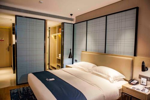 Imagen general del Hotel Echarm Dongxing Minzu Road. Foto 5