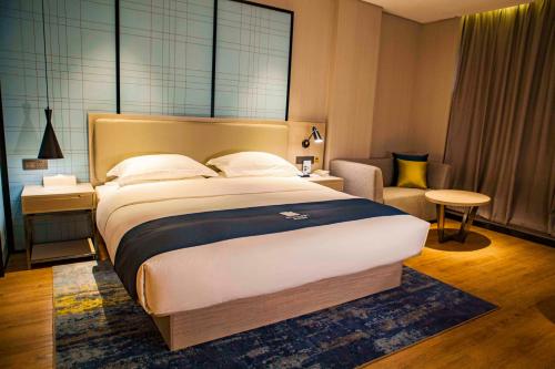 Imagen general del Hotel Echarm Dongxing Minzu Road. Foto 6