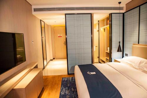 Imagen general del Hotel Echarm Dongxing Minzu Road. Foto 9