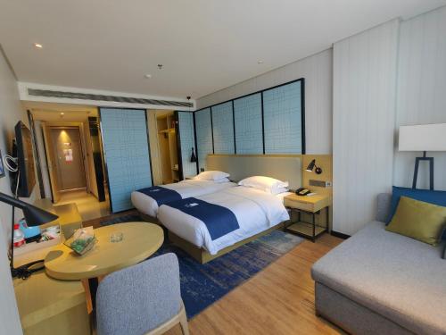 Imagen de la habitación del Hotel Echarm Dongxing Minzu Road. Foto 19