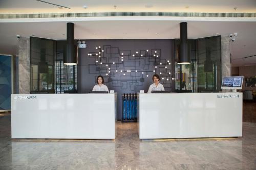 Imagen general del Hotel Echarm Dongxing Minzu Road. Foto 17