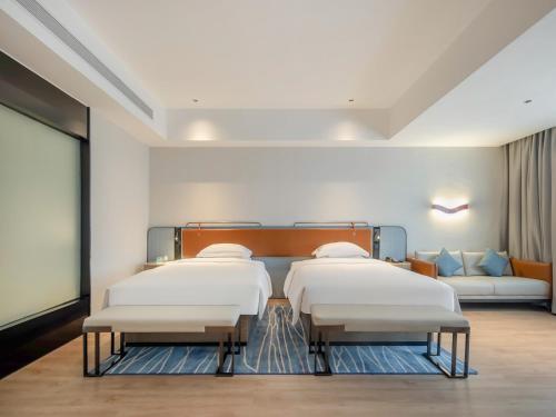 Imagen de la habitación del Hotel Echarm Fangchenggang Administration Center High Speed Railway Station. Foto 19