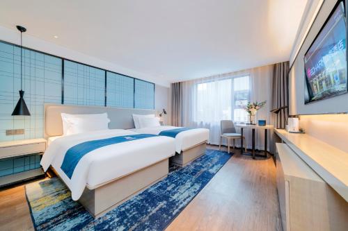 Imagen general del Hotel Echarm Guanggu Tiandi. Foto 6