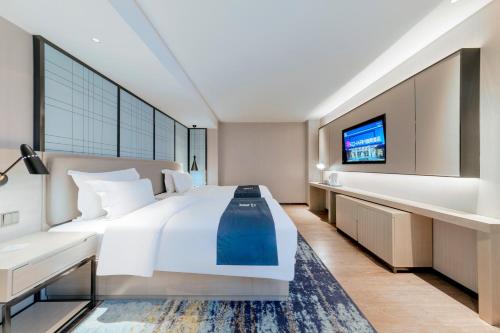 Imagen general del Hotel Echarm Guanggu Tiandi. Foto 7