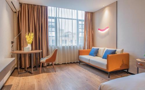 Imagen de la habitación del Hotel Echarm Guangzhou Jiahe Helong Branch. Foto 17