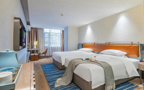 Imagen general del Hotel Echarm Guangzhou Jiahe Helong Branch. Foto 15