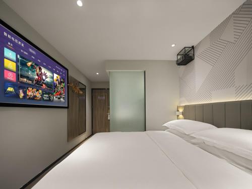 Imagen general del Hotel Echarm Guangzhou North Railway Station Huadu Square Branch. Foto 6