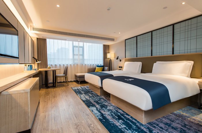 Imagen de la habitación del Hotel Echarm Guangzhou Ximenkou Branch. Foto 10