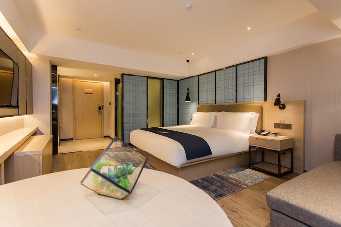Imagen de la habitación del Hotel Echarm Guangzhou Ximenkou Branch. Foto 13