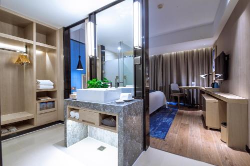 Imagen general del Hotel Echarm Guigang Wanda High Speed Railway Station. Foto 13