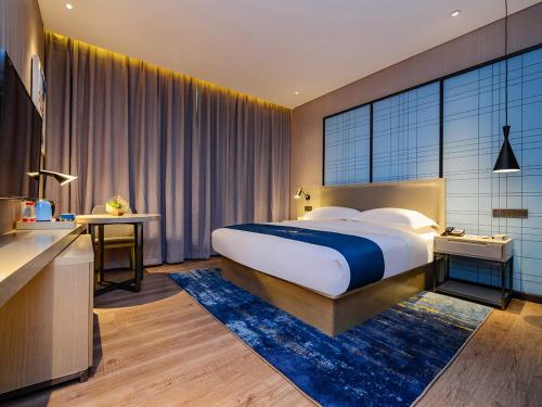 Imagen de la habitación del Hotel Echarm Guiyang Airport Outlet Store. Foto 12