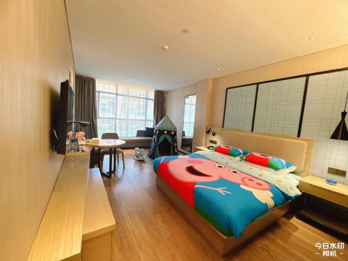 Imagen de la habitación del Hotel Echarm Guiyang Municipal Government Lin Cheng Xi Road Metro Station. Foto 14