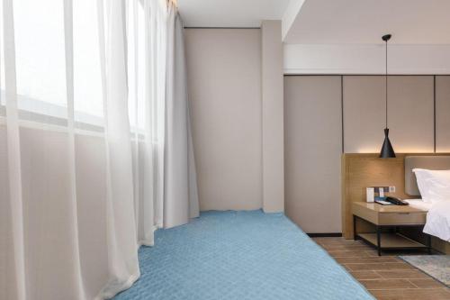 Imagen general del Hotel Echarm Haikou. Foto 10