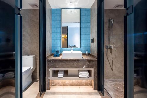 Imagen de la habitación del Hotel Echarm Haikou Friendship Sunshine City Qiaozhong Road Branch. Foto 15