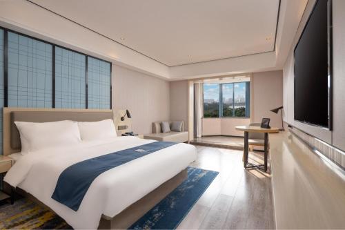 Imagen de la habitación del Hotel Echarm Haikou Friendship Sunshine City Qiaozhong Road Branch. Foto 16