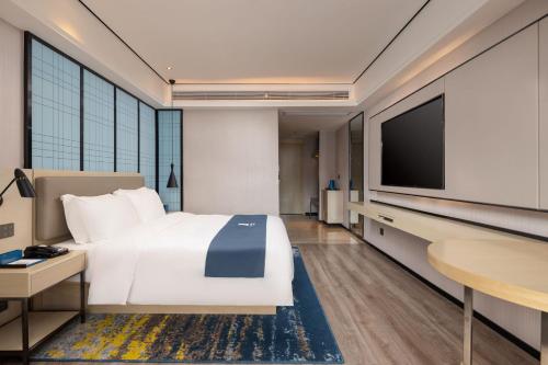 Imagen general del Hotel Echarm Haikou Friendship Sunshine City Qiaozhong Road Branch. Foto 5