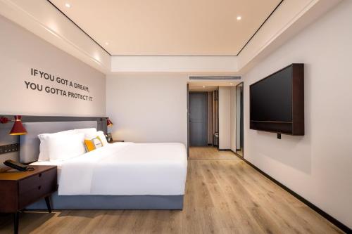 Imagen general del Hotel Echarm Haikou Friendship Sunshine City Qiaozhong Road Branch. Foto 10