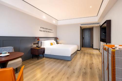 Imagen de la habitación del Hotel Echarm Haikou Friendship Sunshine City Qiaozhong Road Branch. Foto 18