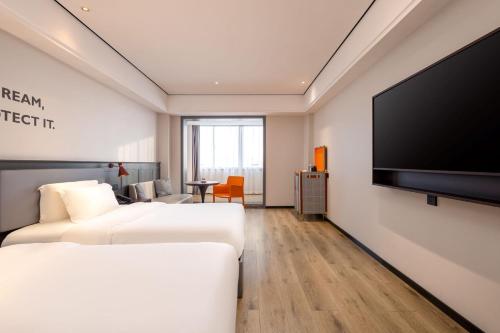 Imagen general del Hotel Echarm Haikou Friendship Sunshine City Qiaozhong Road Branch. Foto 13