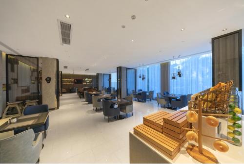 Imagen general del Hotel Echarm Haikou Zhongshan South Road East High Speed Railway Station. Foto 2