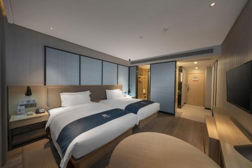 Imagen general del Hotel Echarm Haikou Zhongshan South Road East High Speed Railway Station. Foto 4