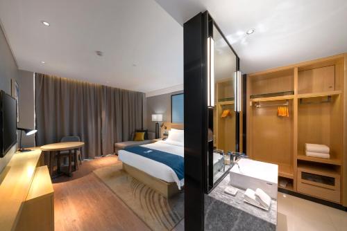 Imagen general del Hotel Echarm Haikou Zhongshan South Road East High Speed Railway Station. Foto 8