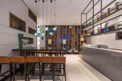 Imagen general del Hotel Echarm Haikou Zhongshan South Road East High Speed Railway Station. Foto 10