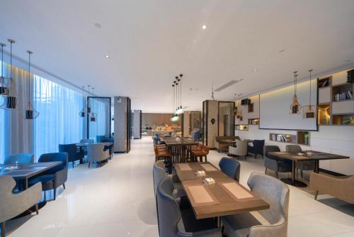 Imagen general del Hotel Echarm Haikou Zhongshan South Road East High Speed Railway Station. Foto 13