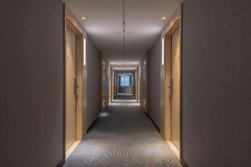 Imagen general del Hotel Echarm Haikou Zhongshan South Road East High Speed Railway Station. Foto 14