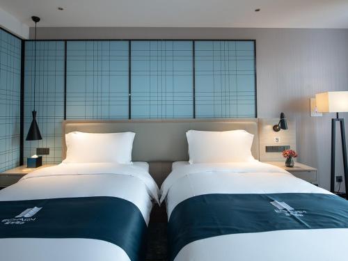 Imagen general del Hotel Echarm Heyuan Longchuan. Foto 1