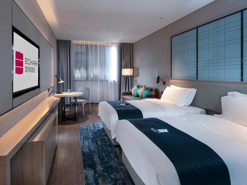 Imagen general del Hotel Echarm Heyuan Longchuan. Foto 3