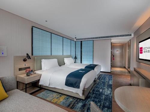 Imagen de la habitación del Hotel Echarm Heyuan Longchuan. Foto 15