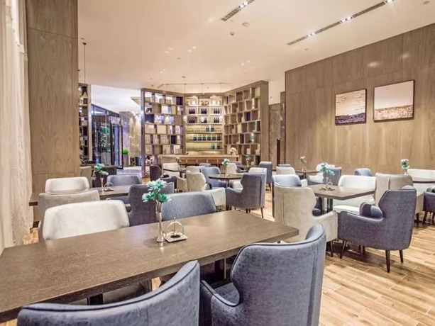 Imagen del bar/restaurante del Hotel Echarm Hotel (Qionghai Wanquan River). Foto 2