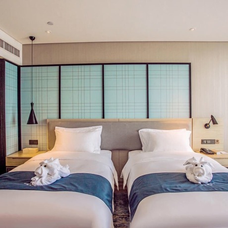 Imagen de la habitación del Hotel Echarm Hotel (Qionghai Wanquan River). Foto 8