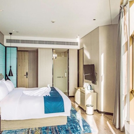 Imagen de la habitación del Hotel Echarm Hotel (Qionghai Wanquan River). Foto 11
