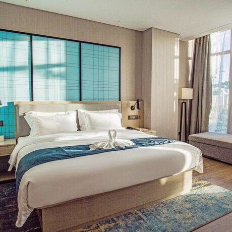 Imagen de la habitación del Hotel Echarm Hotel (Qionghai Wanquan River). Foto 15