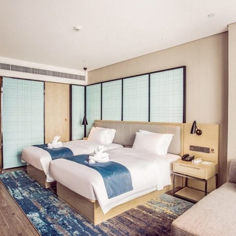 Imagen de la habitación del Hotel Echarm Hotel (Qionghai Wanquan River). Foto 18