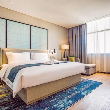 Imagen de la habitación del Hotel Echarm Hotel (Qionghai Wanquan River). Foto 19