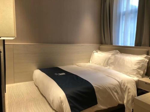 Imagen de la habitación del Hotel Echarm Hotel - Wuhan University Hongshan Square Metro Station. Foto 17