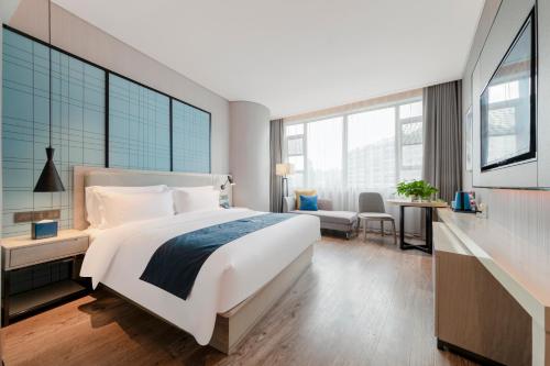 Imagen de la habitación del Hotel Echarm Hotel - Wuhan University Hongshan Square Metro Station. Foto 19