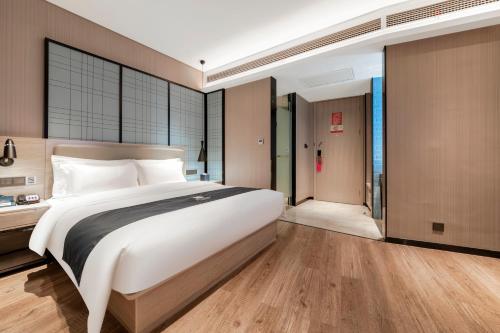 Imagen de la habitación del Hotel Echarm Hotel - Wuhan University Hongshan Square Metro Station. Foto 20