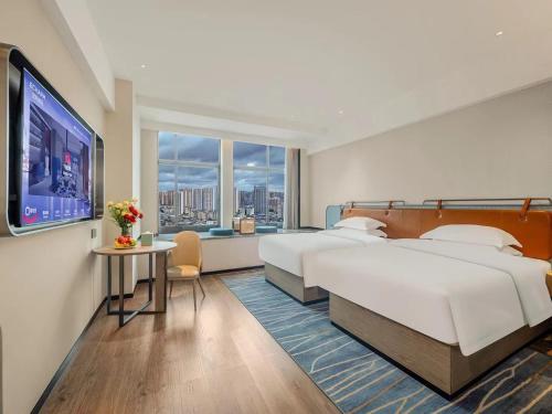 Imagen general del Hotel Echarm Laibin Financial Investment Building Zhenghe Pedestrian Street Shop. Foto 4