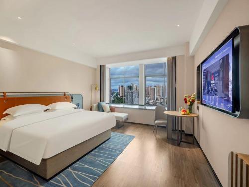 Imagen general del Hotel Echarm Laibin Financial Investment Building Zhenghe Pedestrian Street Shop. Foto 8