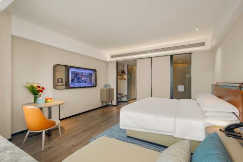 Imagen general del Hotel Echarm Laibin Financial Investment Building Zhenghe Pedestrian Street Shop. Foto 12