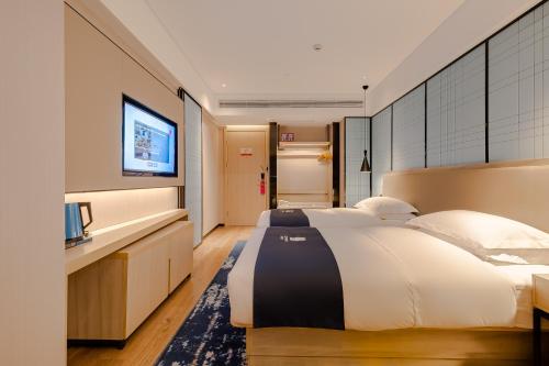 Imagen general del Hotel Echarm Mianyang High-speed Railway Station CapitaLand Plaza. Foto 2