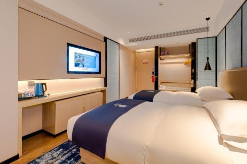 Imagen general del Hotel Echarm Mianyang High-speed Railway Station CapitaLand Plaza. Foto 4