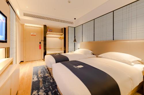 Imagen general del Hotel Echarm Mianyang High-speed Railway Station CapitaLand Plaza. Foto 5