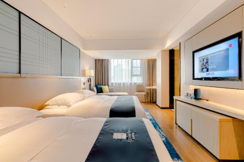 Imagen general del Hotel Echarm Mianyang High-speed Railway Station CapitaLand Plaza. Foto 8