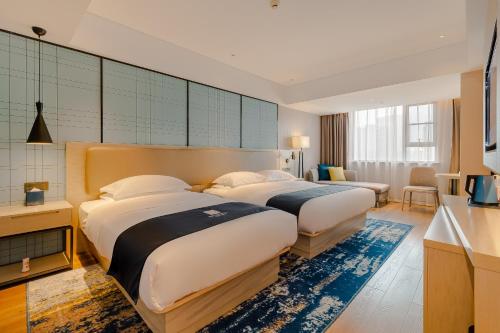 Imagen general del Hotel Echarm Mianyang High-speed Railway Station CapitaLand Plaza. Foto 9